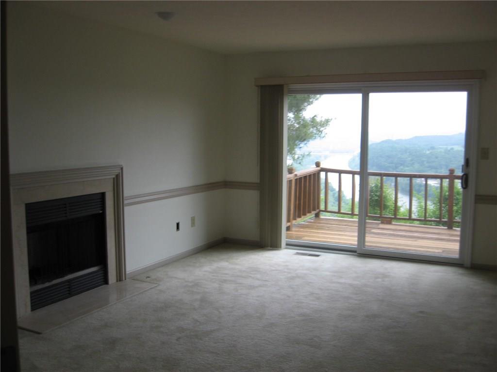 141 Shadow Ridge Drive Pittsburgh, PA 15238 - Photo 5 of 21 FAMILY ROOM W/ GAS FIREPLACE & DECK OVERLOOKING ALLEGHENY RIVER