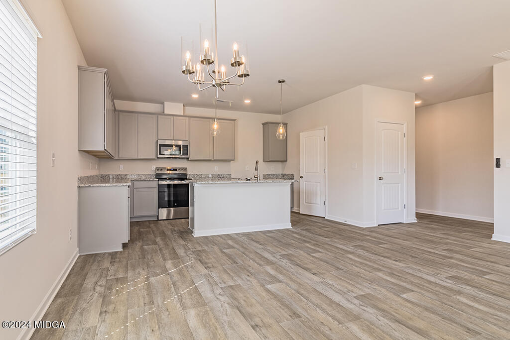 324 Rusty Plow Lane, Unit 33 Perry, GA 31069 - Photo 11 of 44 102-Corn-Field-Cir-Dining-Rm-Kitchen