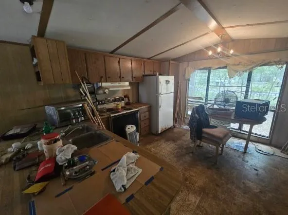 a room with furniture and a large window