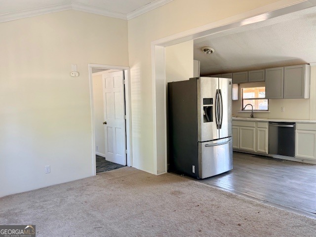721 Ronnie Street Metter, GA 30439 - Photo 3 of 18 a refrigerator freezer sitting in a kitchen