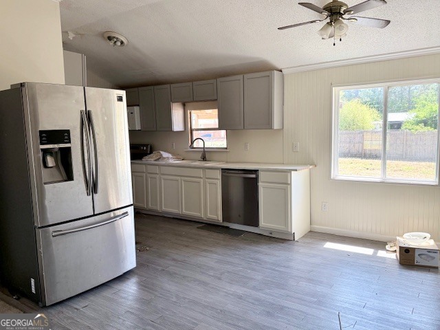 721 Ronnie Street Metter, GA 30439 - Photo 6 of 18 a kitchen with stainless steel appliances a refrigerator sink and microwave