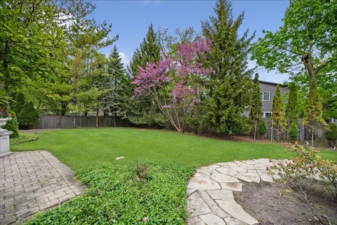 a view of a backyard with a garden