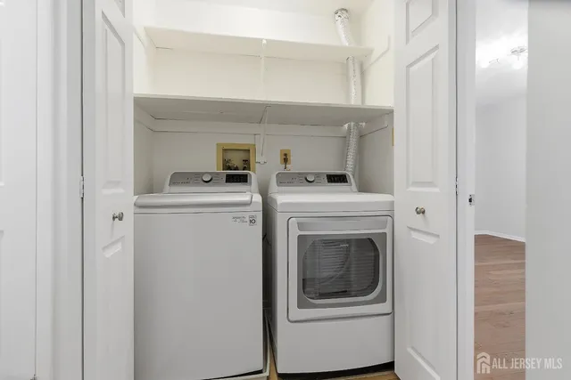 a utility room with dryer and washer