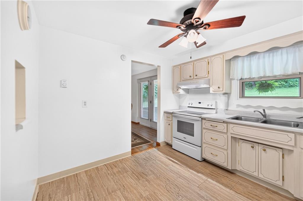 224 Bowman Road Bridgeville, PA 15017 - Photo 15 of 50 The kitchen is the heart og this home. Two entrances allow an easy, seamless flow for guests and every day use. There's plenty of space for an eat-in table, bar height table or coffee station for the morning pick-me up!