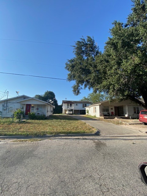 409 Chaparral Street Alice, TX 78332 - Photo 6 of 24 a house view with a outdoor space