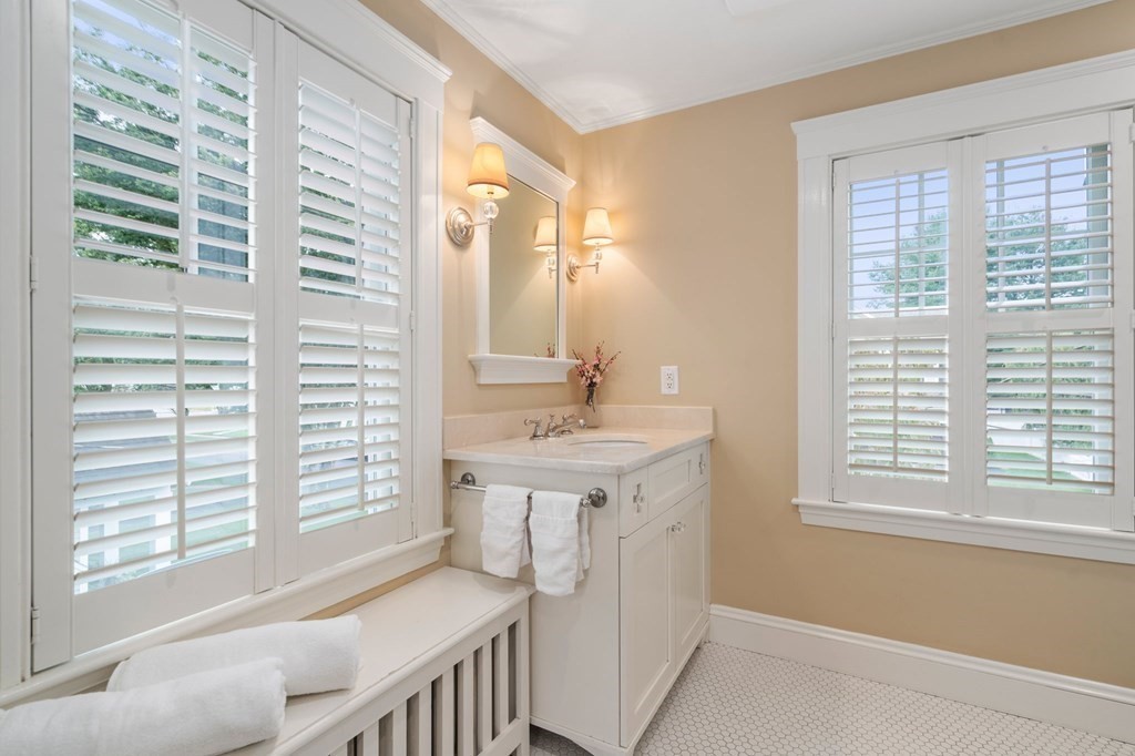 66 Stevens Road Needham, MA 02492 - Photo 16 of 33 a spacious bathroom with a sink a bathtub and next to a window