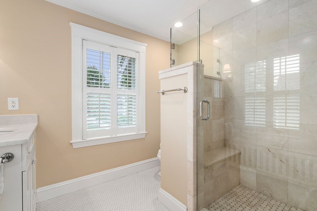 66 Stevens Road Needham, MA 02492 - Photo 17 of 33 a bathroom with a shower and a sink