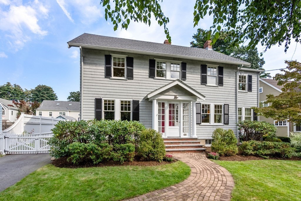 66 Stevens Road Needham, MA 02492 - Photo 2 of 33 a front view of a house with a yard