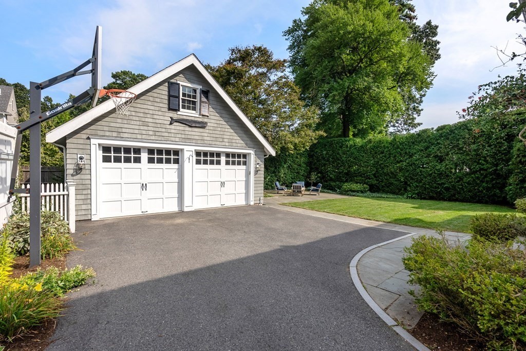 66 Stevens Road Needham, MA 02492 - Photo 31 of 33 a front view of a house with a yard