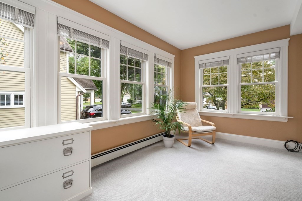 66 Stevens Road Needham, MA 02492 - Photo 32 of 33 a living room with furniture and windows