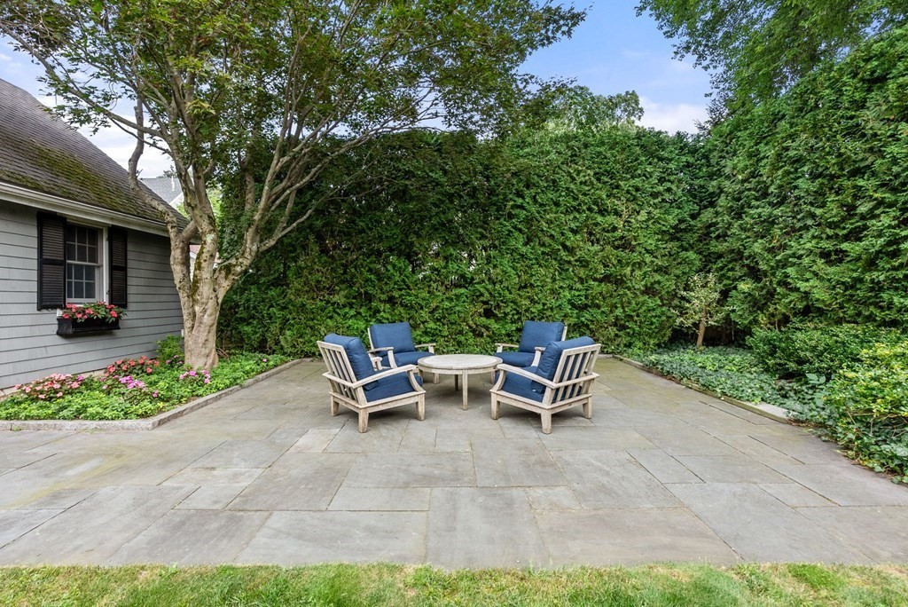 66 Stevens Road Needham, MA 02492 - Photo 33 of 33 a view of backyard with outdoor seating and trees