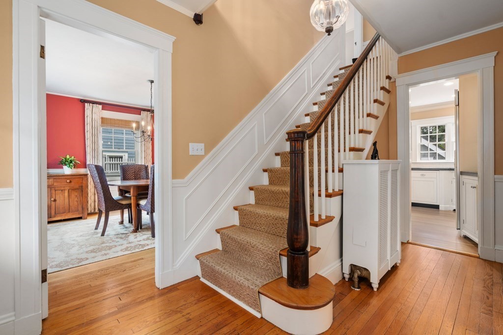 66 Stevens Road Needham, MA 02492 - Photo 4 of 33 a view of entryway and hall with wooden floor