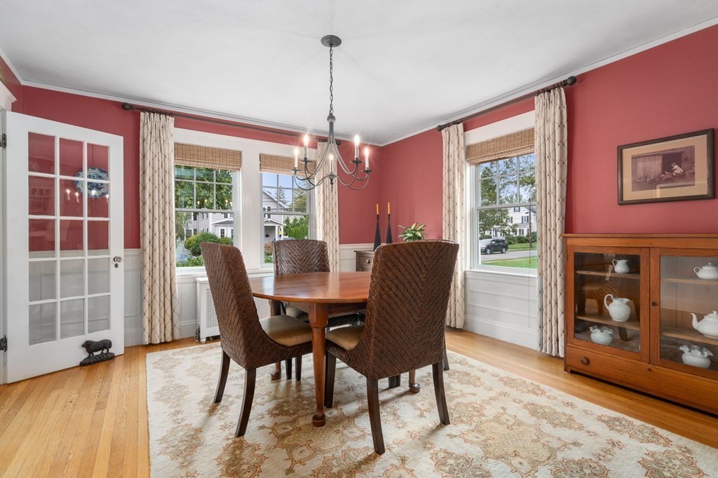 66 Stevens Road Needham, MA 02492 - Photo 10 of 33 a view of a dining room with furniture window and wooden floor
