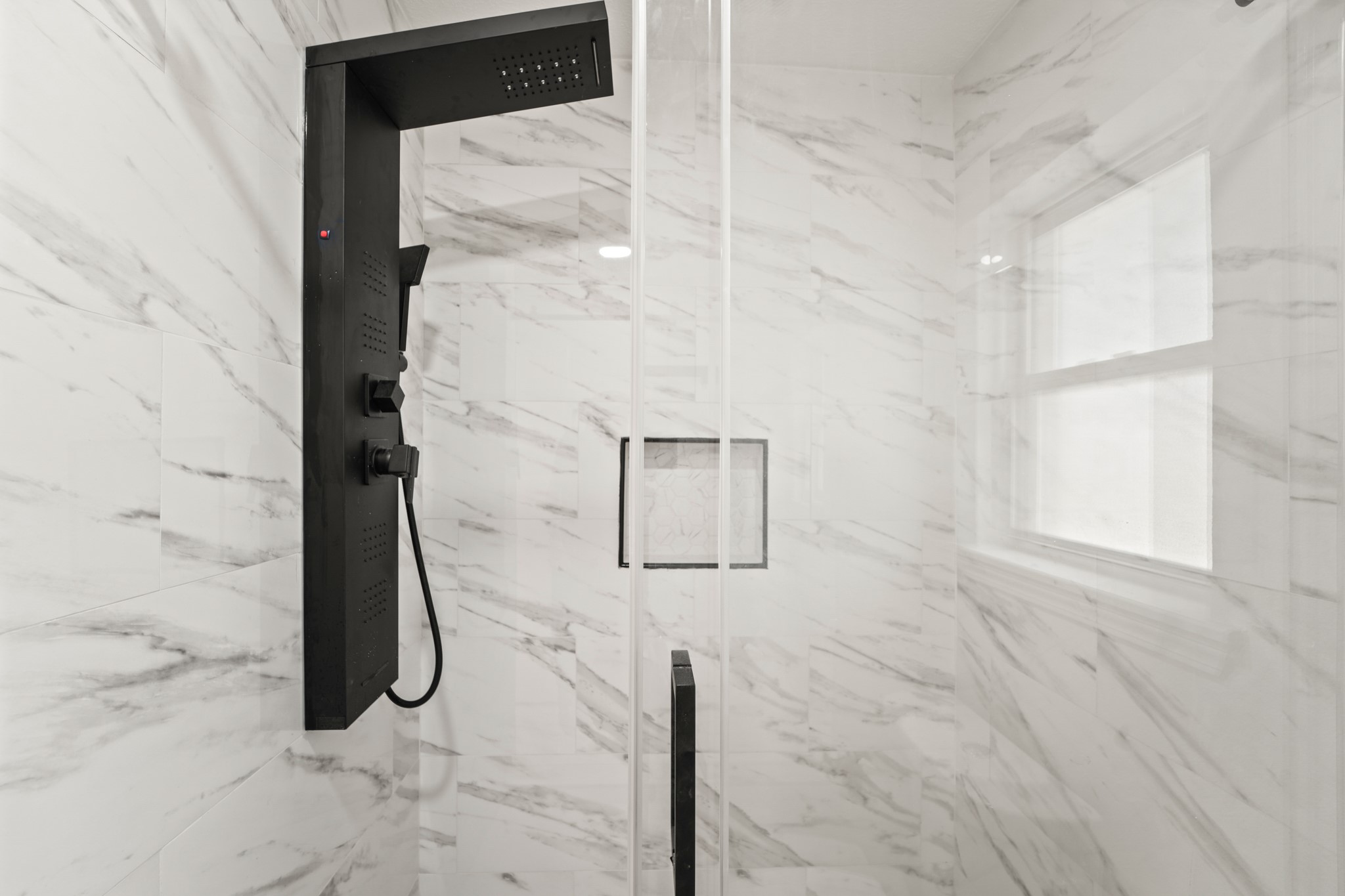 13102 Maxim Drive Houston, TX 77065 - Photo 20 of 45 a bathroom with a shower