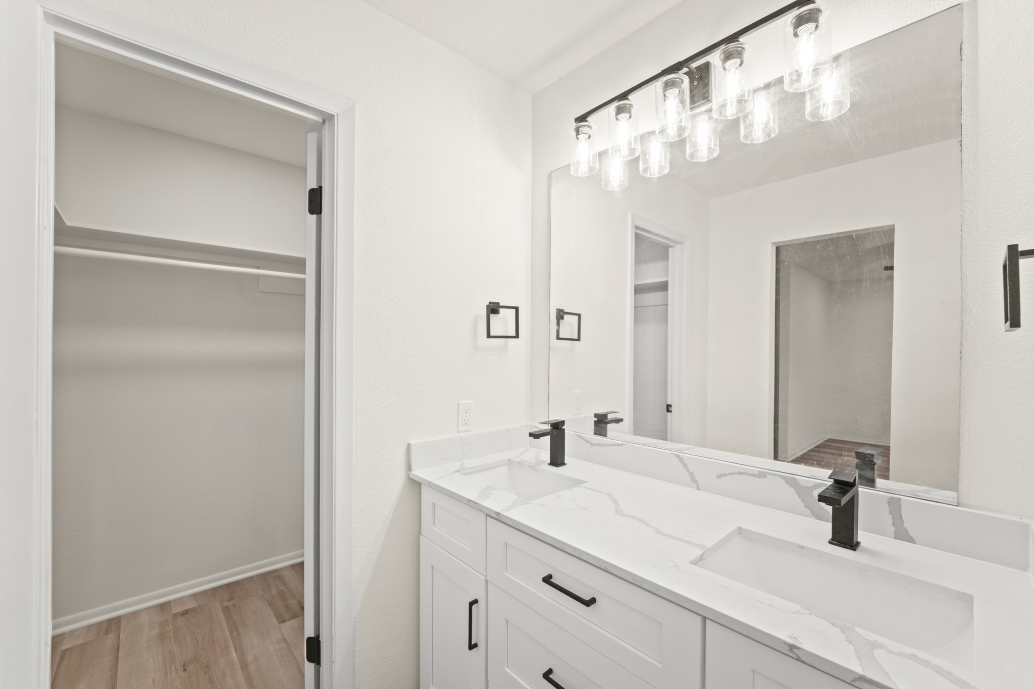 13102 Maxim Drive Houston, TX 77065 - Photo 21 of 45 a bathroom with a sink and a mirror