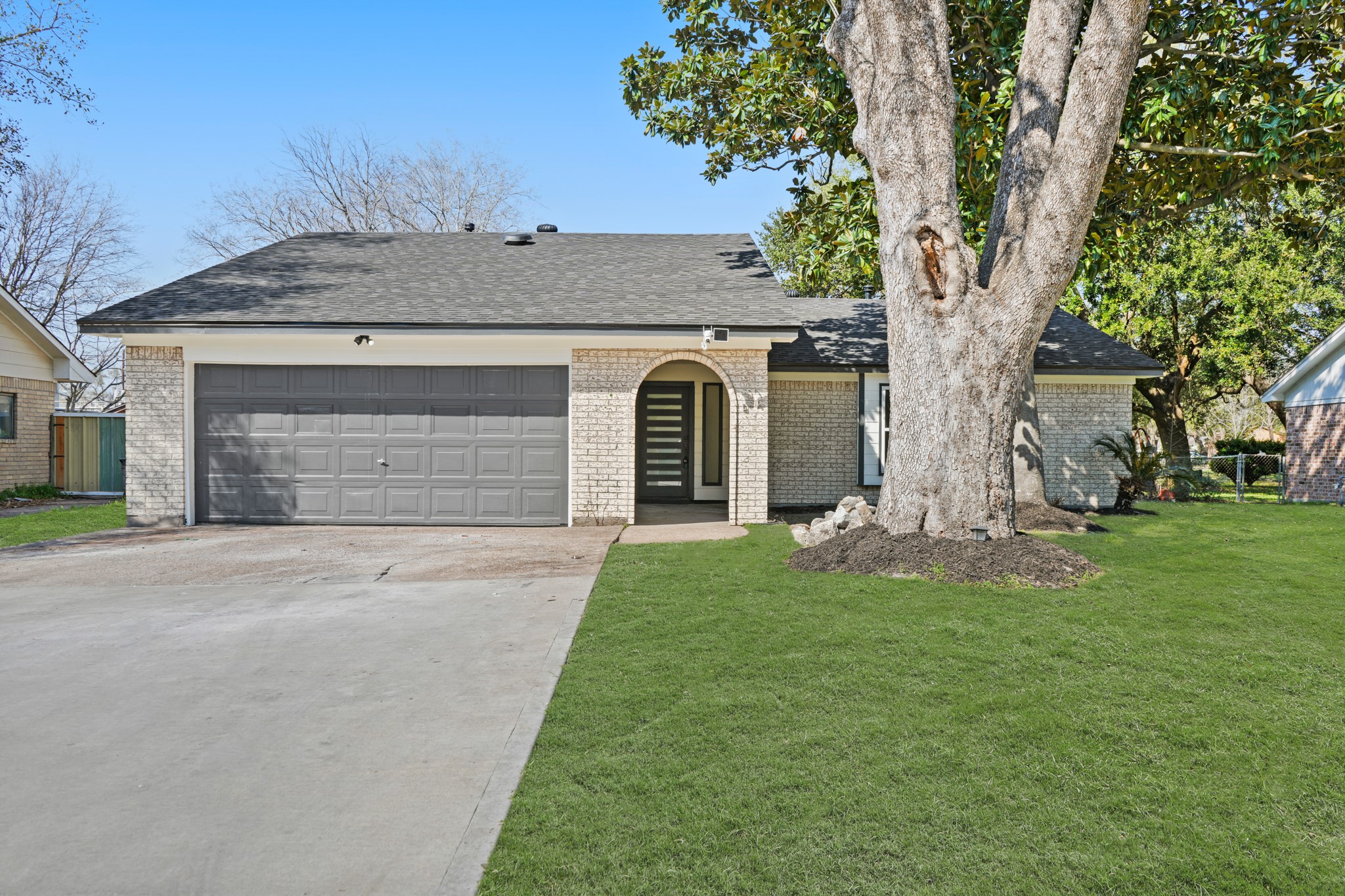 13102 Maxim Drive Houston, TX 77065 - Photo 35 of 45 front view of a house with a yard
