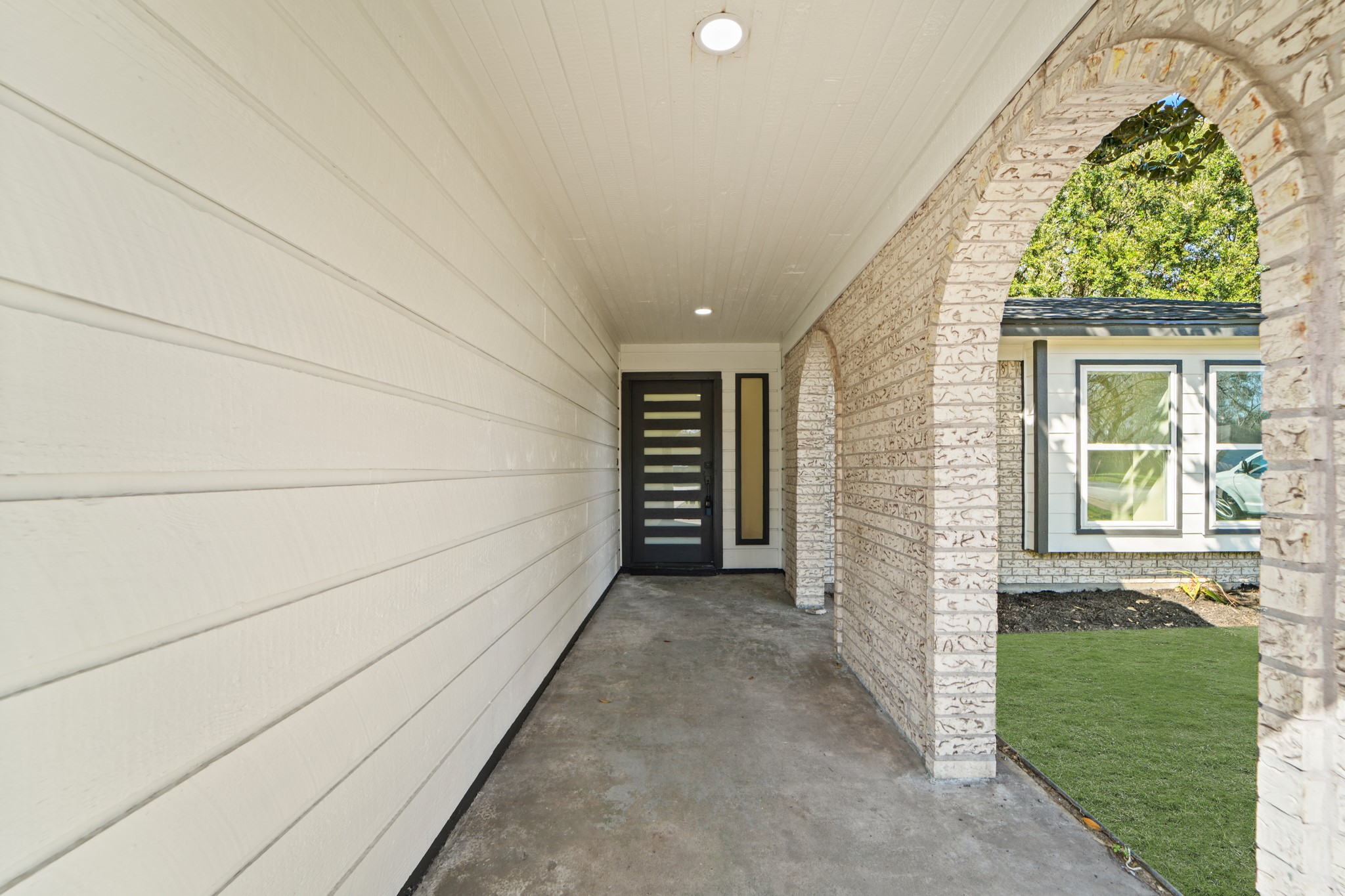 13102 Maxim Drive Houston, TX 77065 - Photo 36 of 45 a view of a pathway of a house with a yard
