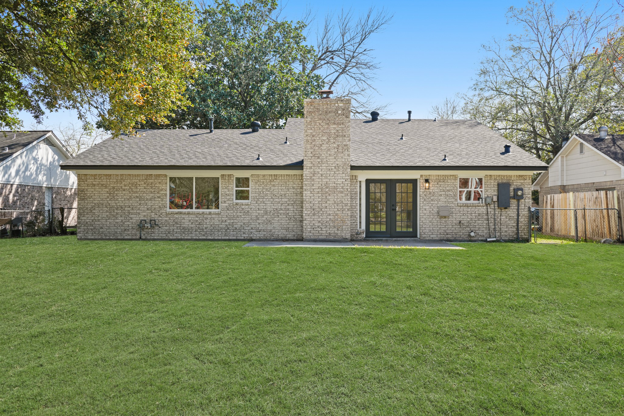13102 Maxim Drive Houston, TX 77065 - Photo 40 of 45 front view of a house with a yard