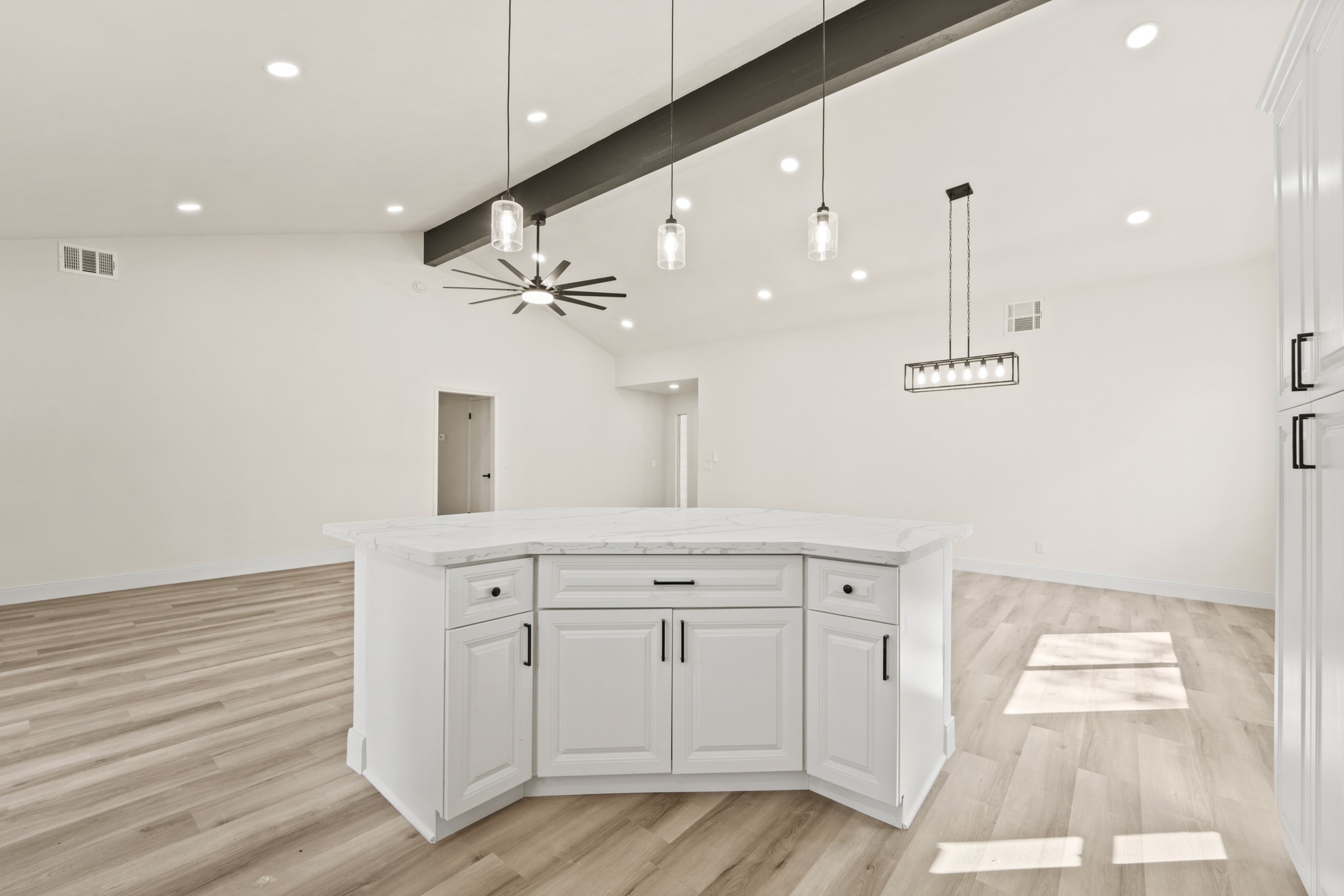 13102 Maxim Drive Houston, TX 77065 - Photo 4 of 45 a view of a kitchen with a sink and wooden floor