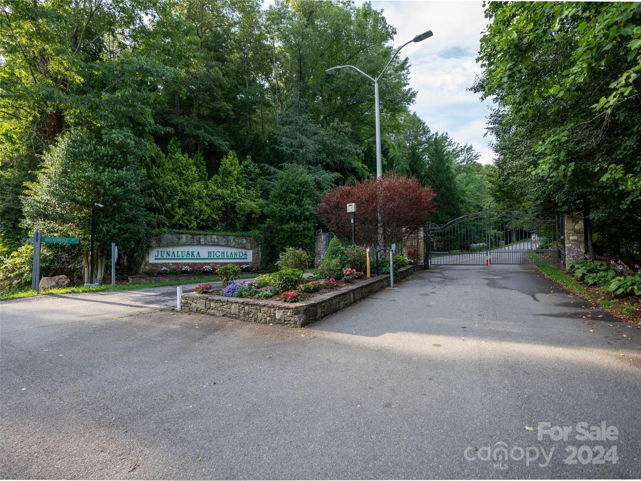 Tbd Rimesdale Way Waynesville, NC 28785 - Photo 10 of 24 a view of a patio with table and chairs and potted plants
