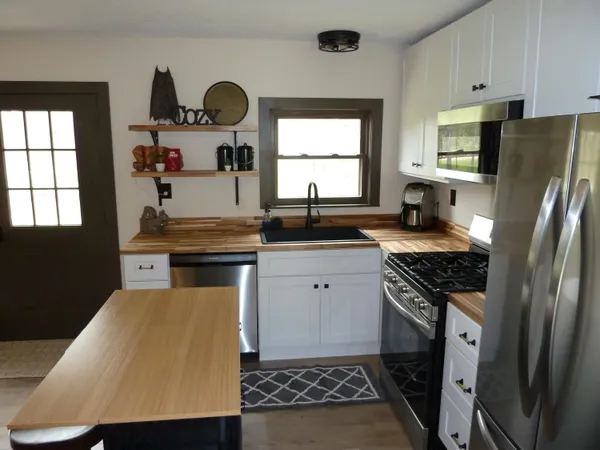 $279,900 | 27 East 9 Mile Road, Irons, MI 49644