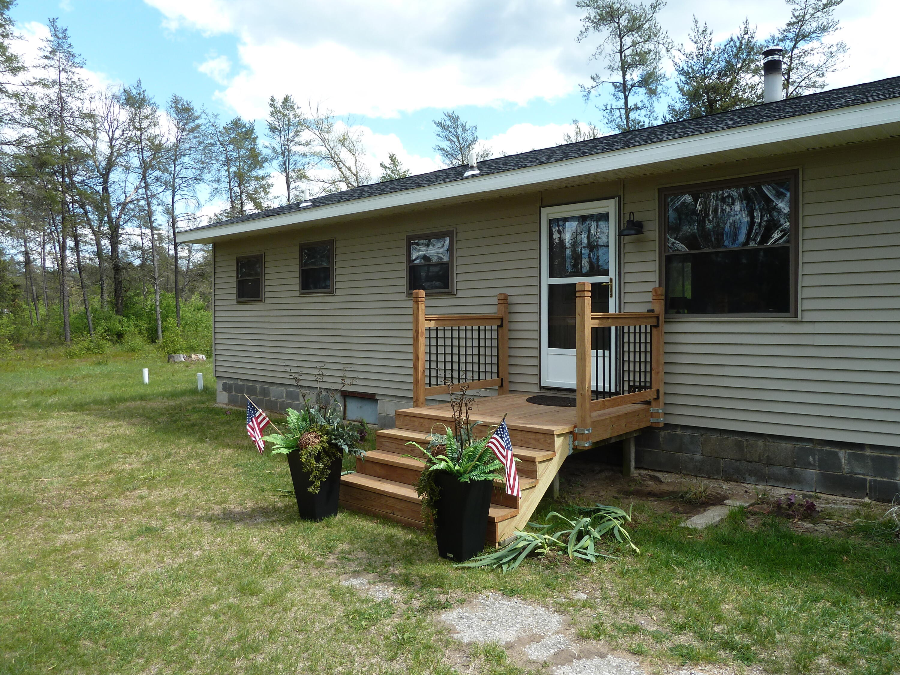 27 East 9 Mile Road Irons, MI 49644 - Photo 2 of 31 exterior