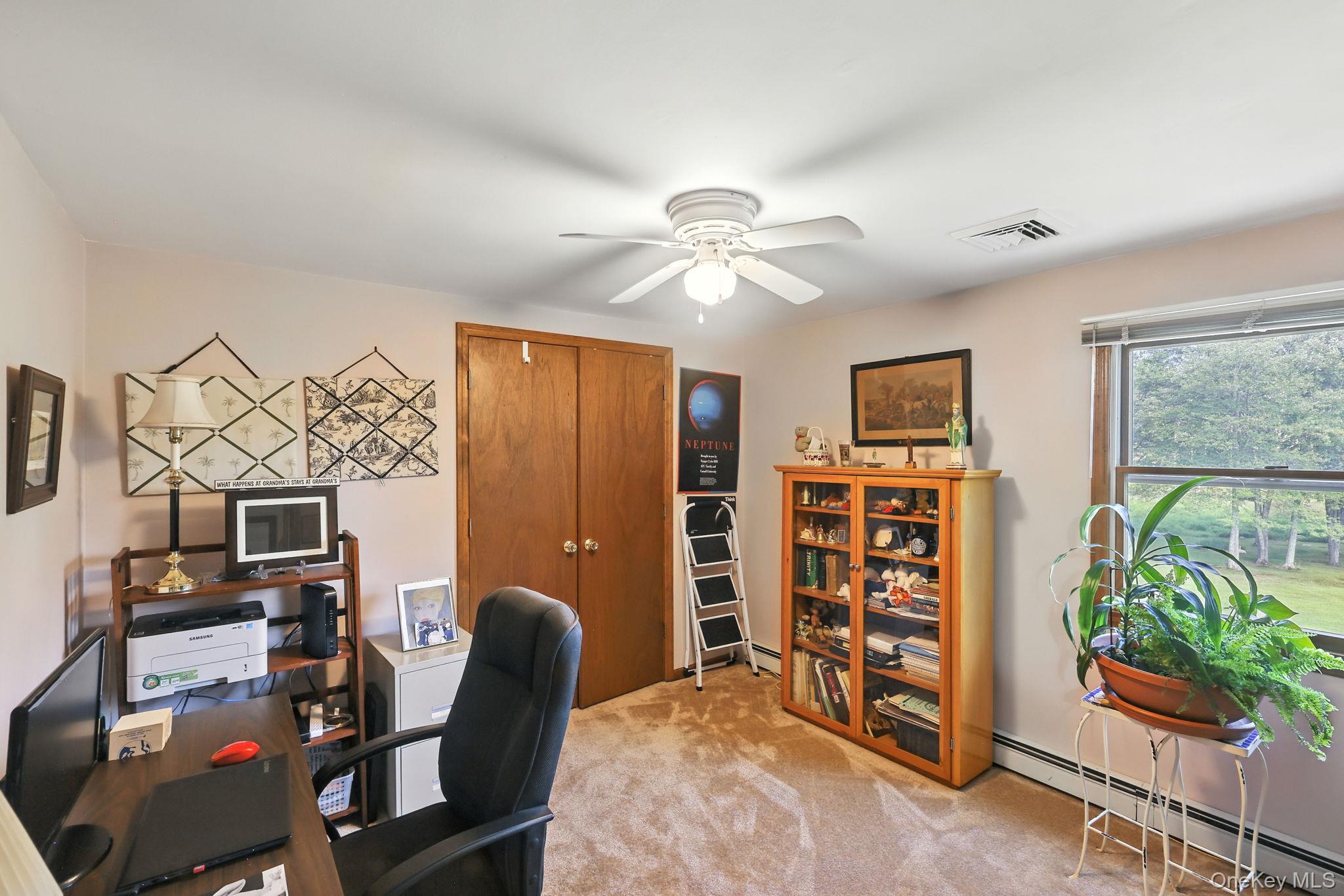 220 North Parliman Road LaGrangeville, NY 12540 - Photo 19 of 41 a view of a workspace with furniture and a window