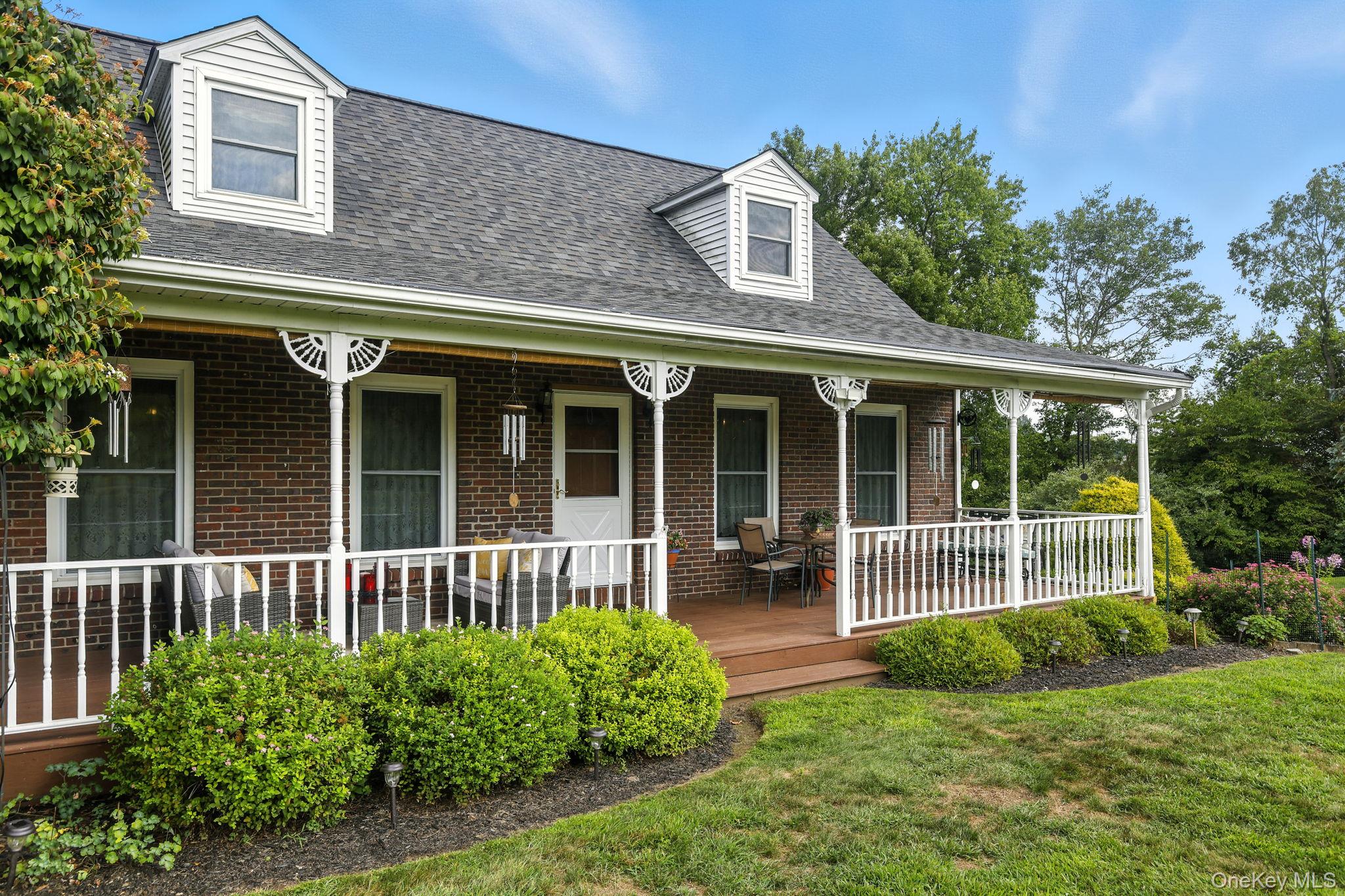 220 North Parliman Road LaGrangeville, NY 12540 - Photo 2 of 41 front view of a house with a yard
