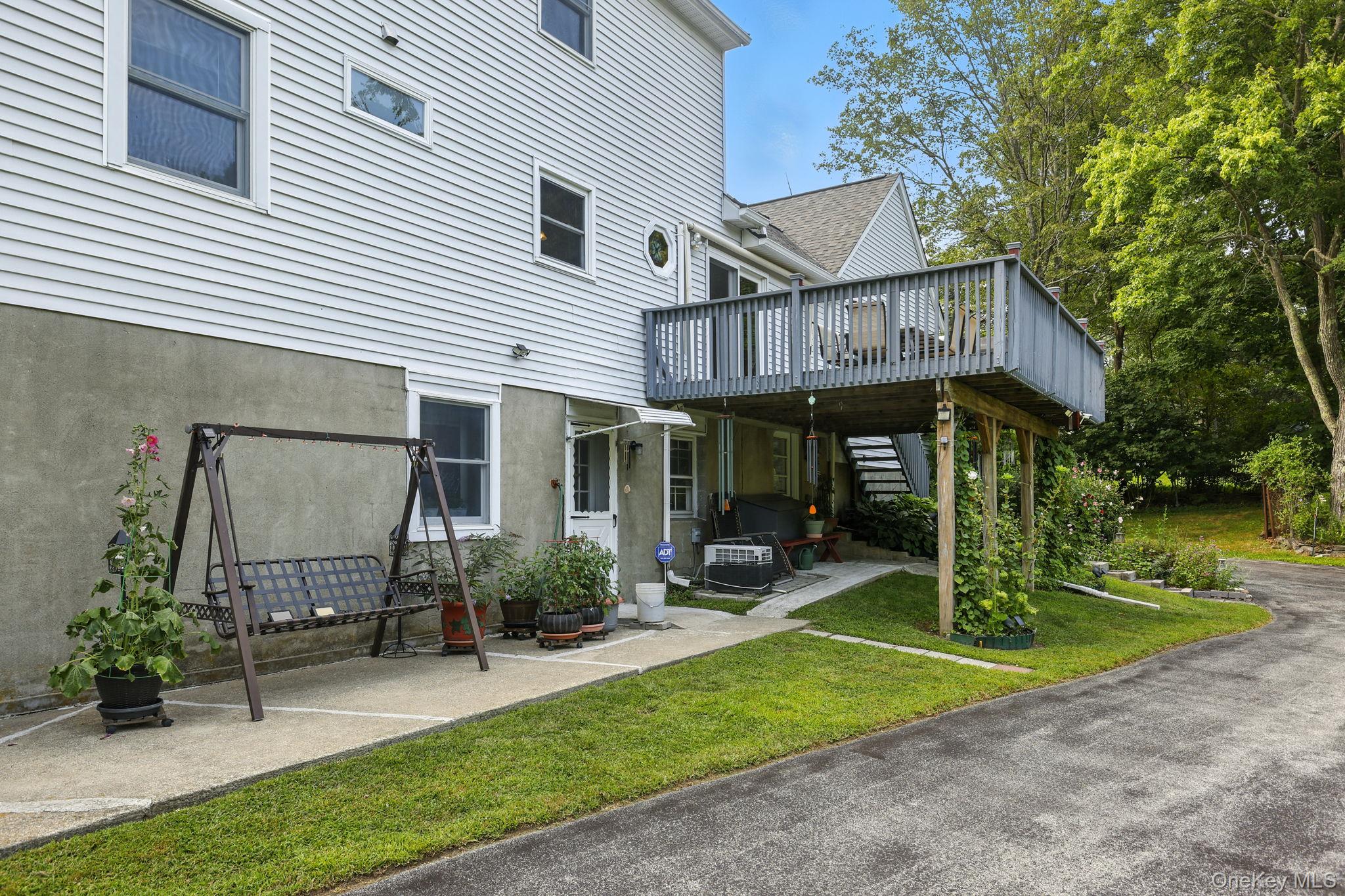 220 North Parliman Road LaGrangeville, NY 12540 - Photo 27 of 41 a view of a chair and table in backyard of house