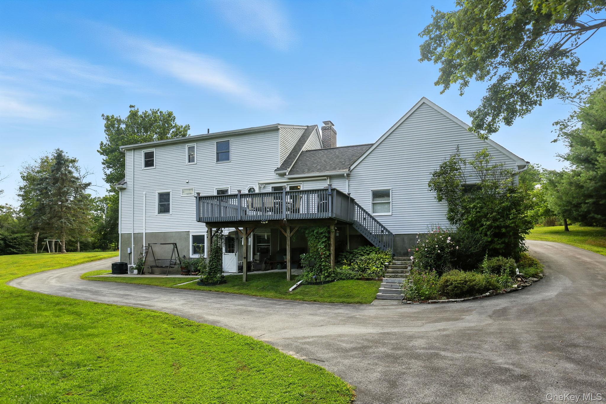 220 North Parliman Road LaGrangeville, NY 12540 - Photo 28 of 41 a front view of a house with a yard