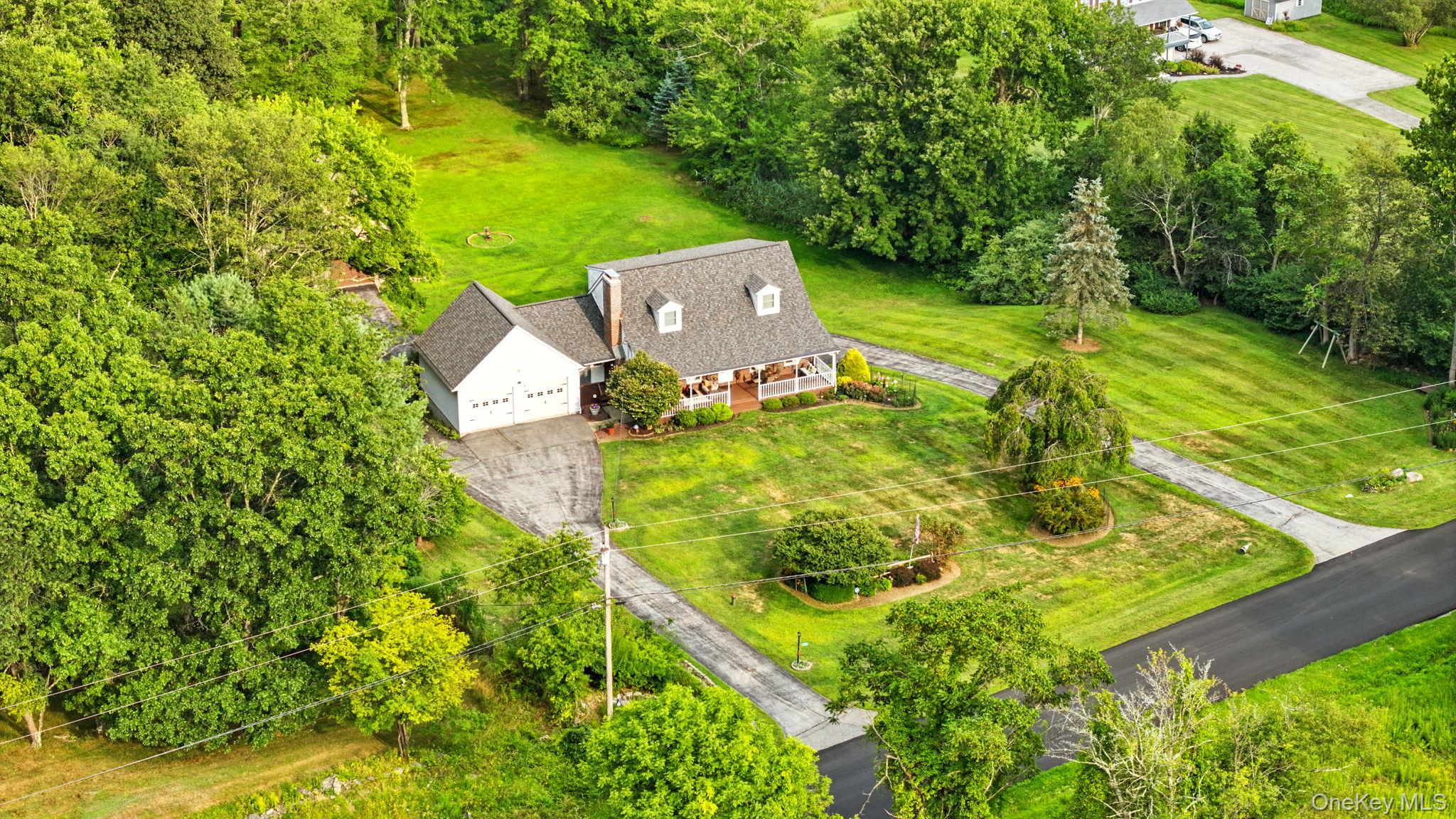 220 North Parliman Road LaGrangeville, NY 12540 - Photo 34 of 41 a view of a back yard with green space