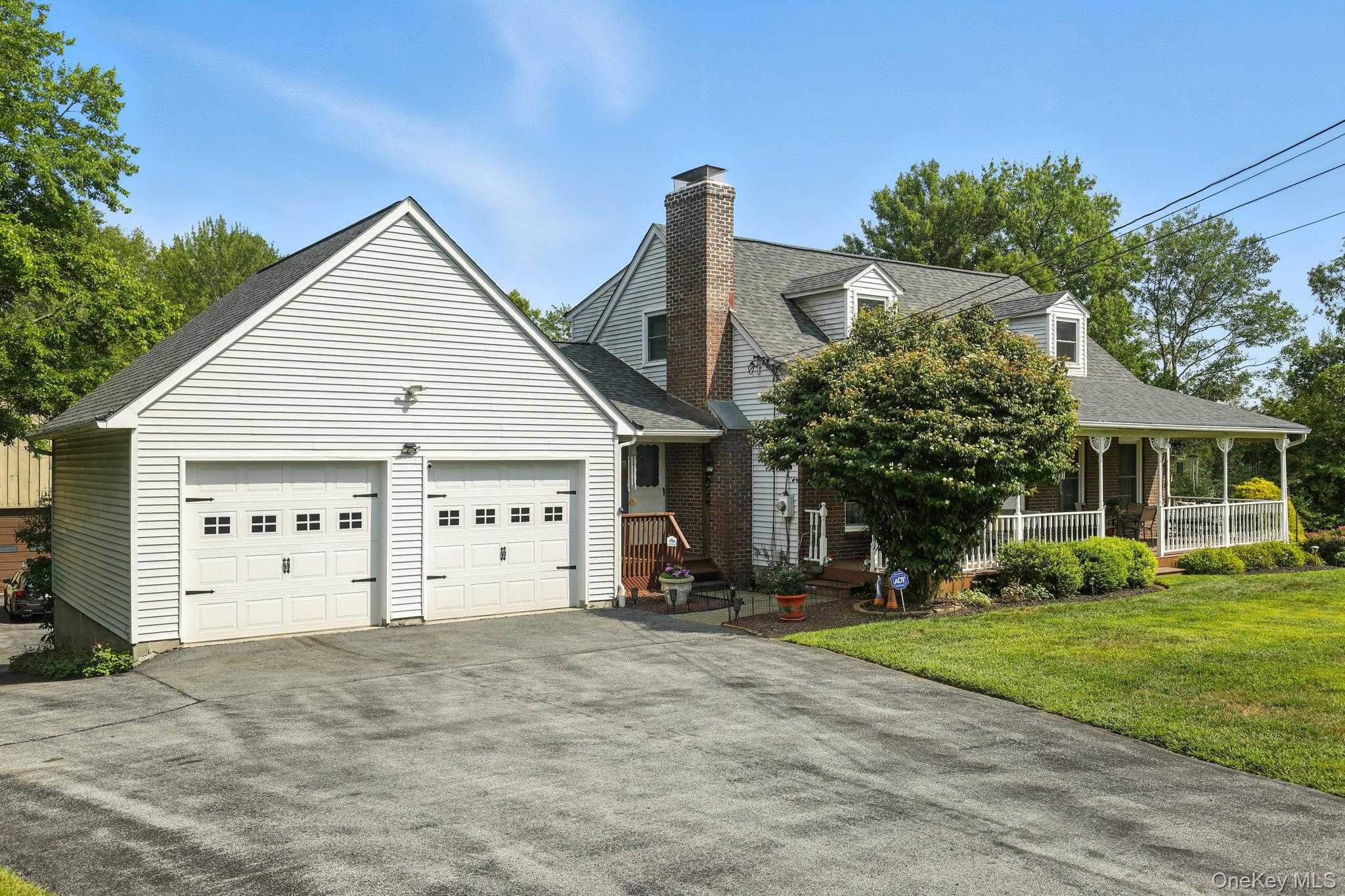 220 North Parliman Road LaGrangeville, NY 12540 - Photo 5 of 41 a view of a house with a yard and plants