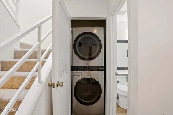a utility room with dryer and washer