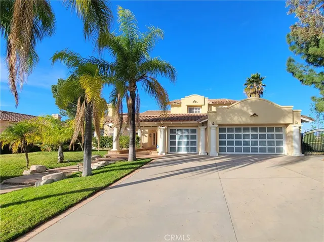 a view of a house with a swimming pool