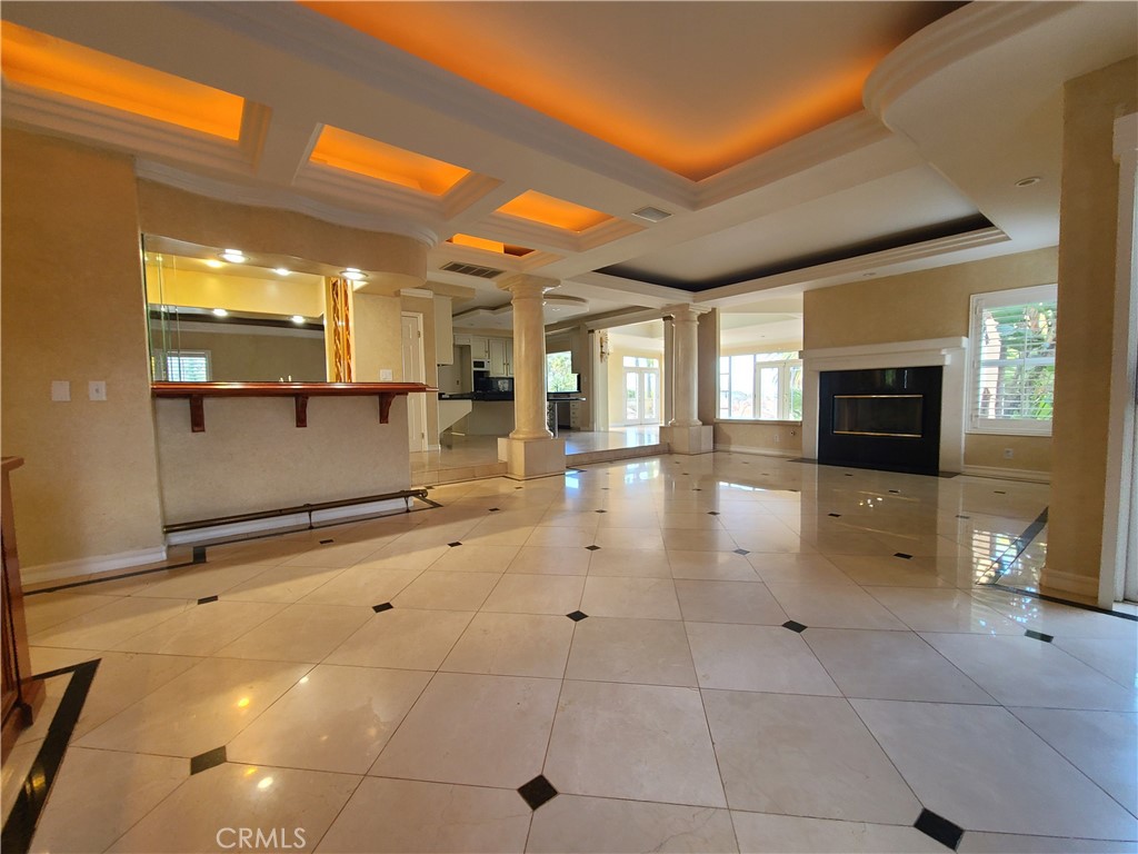 306 Edgemont Drive Redlands, CA 92373 - Photo 7 of 24 a lobby with furniture and flat screen tv