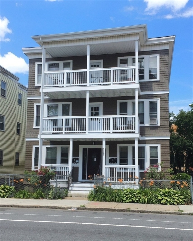 3965 Washington Street Boston, MA 02131 - Photo 1 of 18 a front view of residential houses