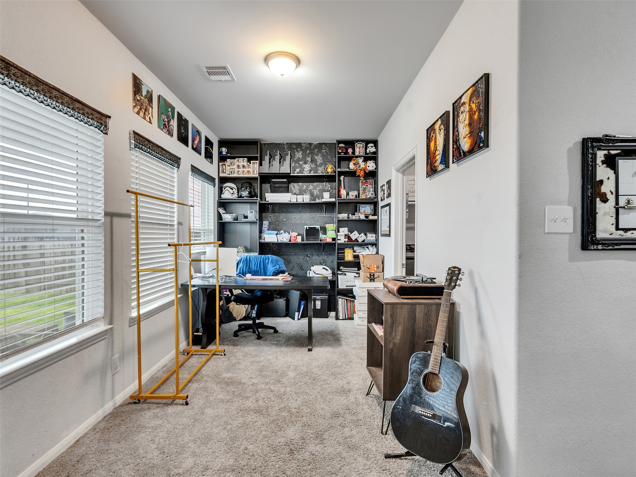8719 Willet Street Baytown, TX 77521 - Photo 29 of 42 a view of a workspace with furniture