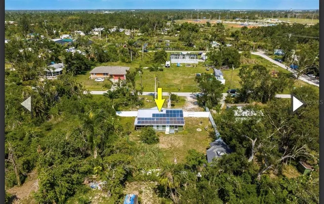 a view of city with ocean