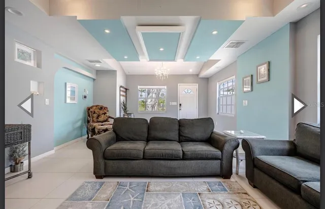 a living room with furniture and a couch