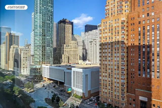 a view of a city with tall buildings