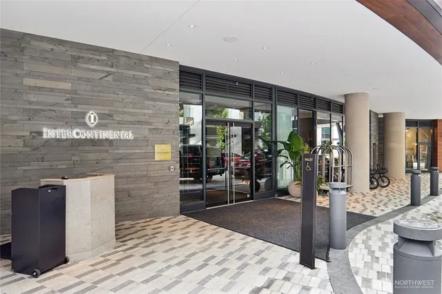 a hallway with a couch and a stove