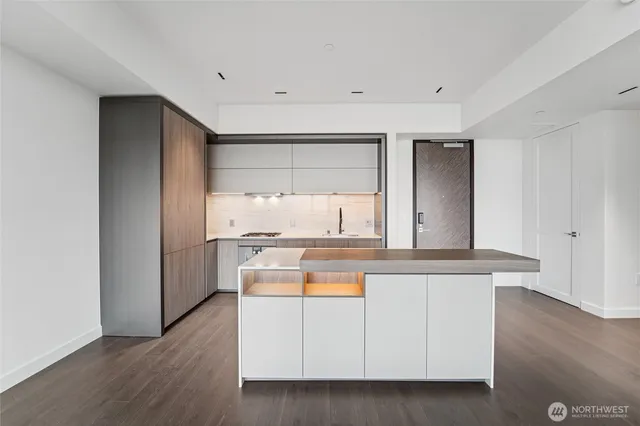 a view of cabinets a sink and dishwasher in a kitchen