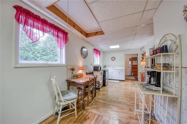a view of a dining room with furniture window and outside view