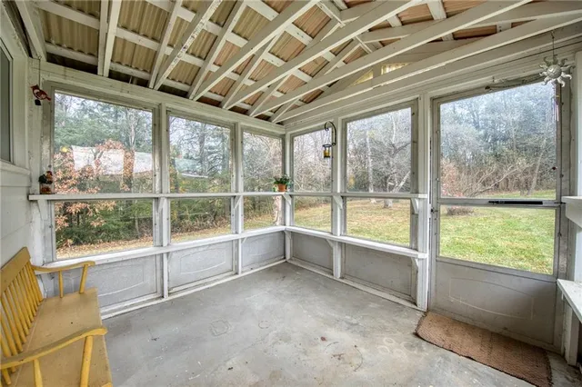 a view of an empty room with a balcony