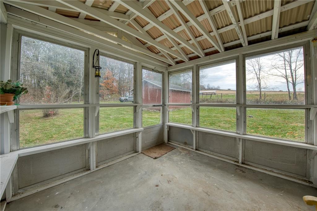 251 Town Road Dayton, PA 16222 - Photo 30 of 44 a view of an empty room with a large window