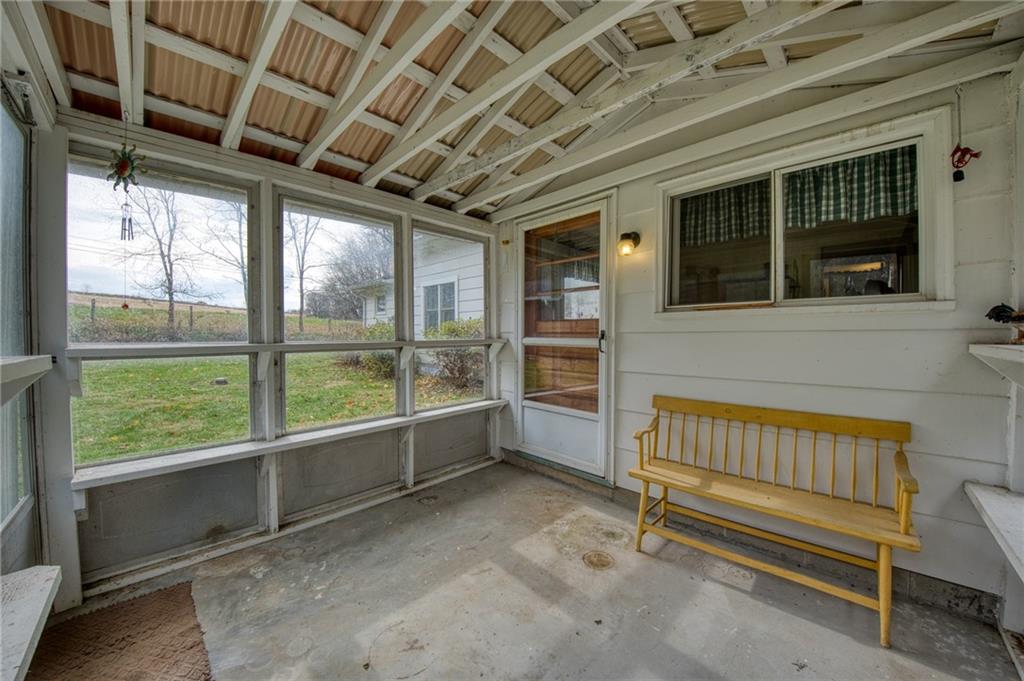 251 Town Road Dayton, PA 16222 - Photo 31 of 44 a view of a room with wooden floor and iron stairs
