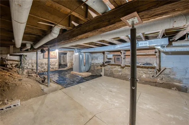 a view of a garage with wooden floor