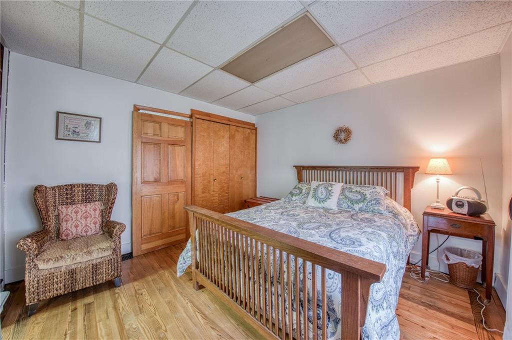 251 Town Road Dayton, PA 16222 - Photo 9 of 44 a bedroom with a bed and wooden floor