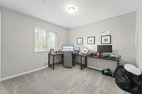 a room with furniture and window