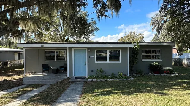 front view of a house with a yard